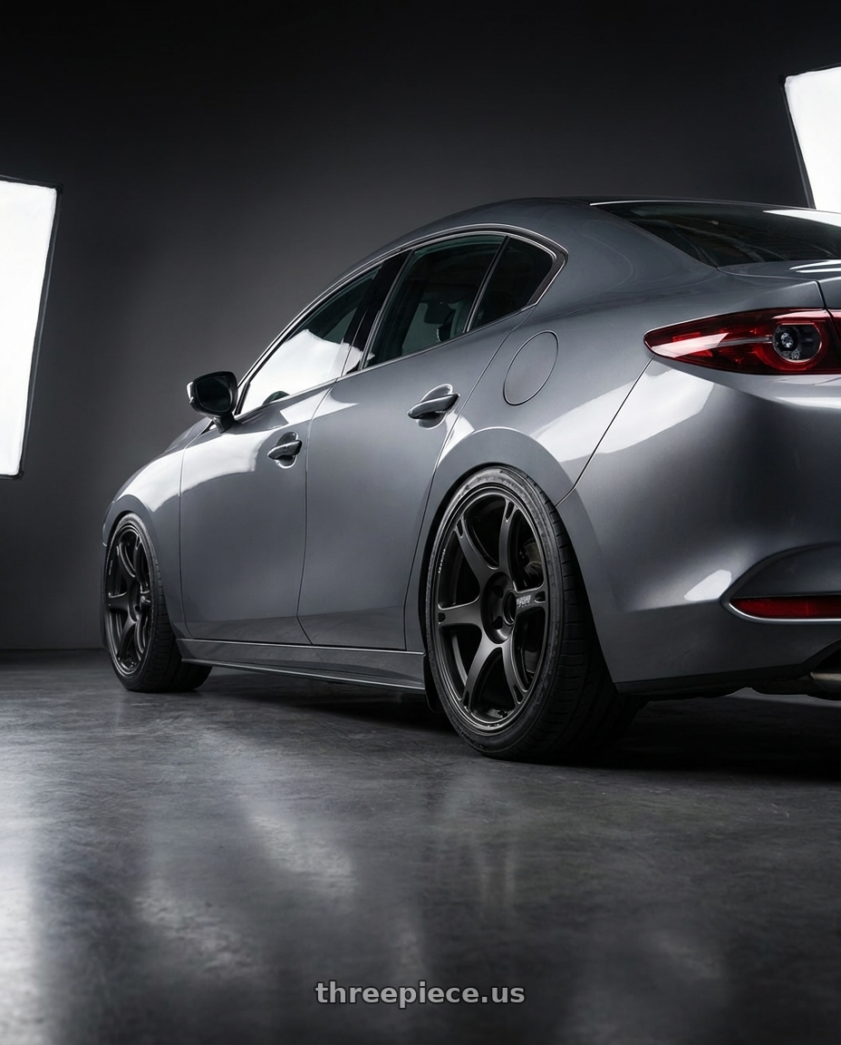 2024 Mazda3 Sedan with Volk Racing TE037 6061 5x120 19x10.5 +22 MATTE GUN BLACK wheels rear three quarter view slight stretch tires