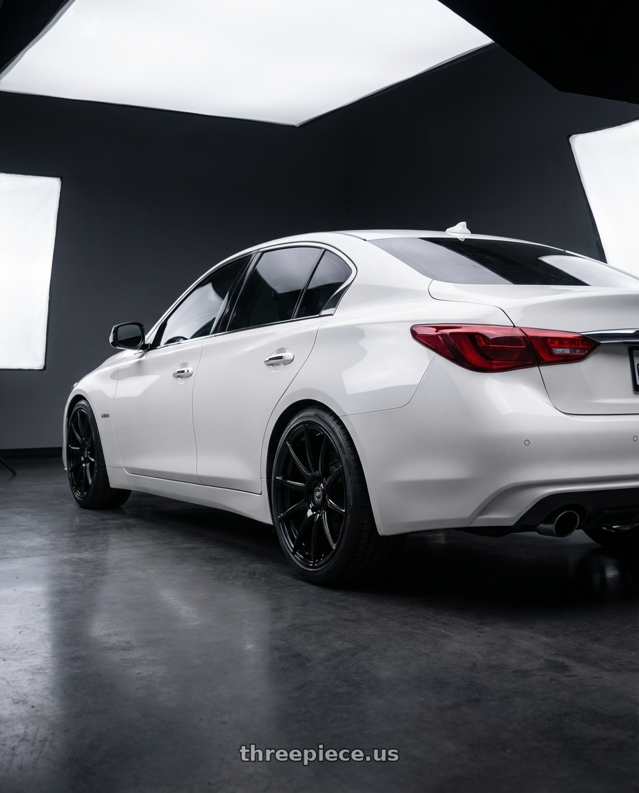 2020 Infiniti Q50 with Forgestar CF10 5x114.3 19x9.5 +29 Gloss Black wheels rear three quarter view square tires