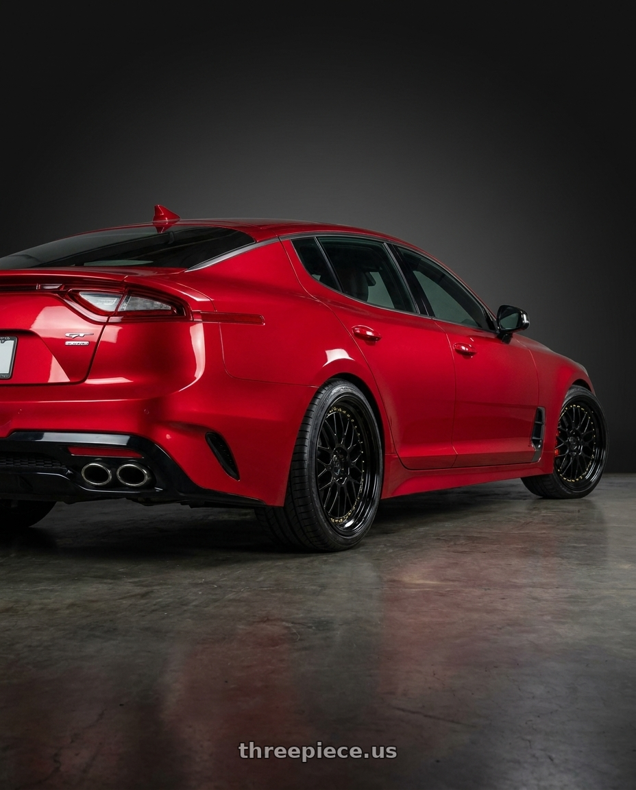 2018 Kia Stinger GT2 AWD with Aodhan AH02 5x114.3 19x8.5 +35 Gloss Black ( Gold Rivet) wheels rear three quarter view square tires