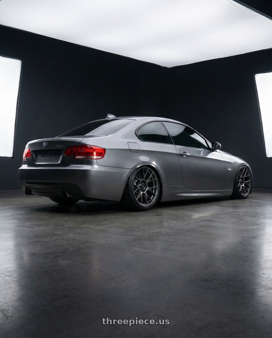 2008 Bmw 335i e92 space grey metallic with Konig Ampliform 5x120 18x9.5+35 Dark Metallic Graphite wheels rear three quarter view slight stretch tires