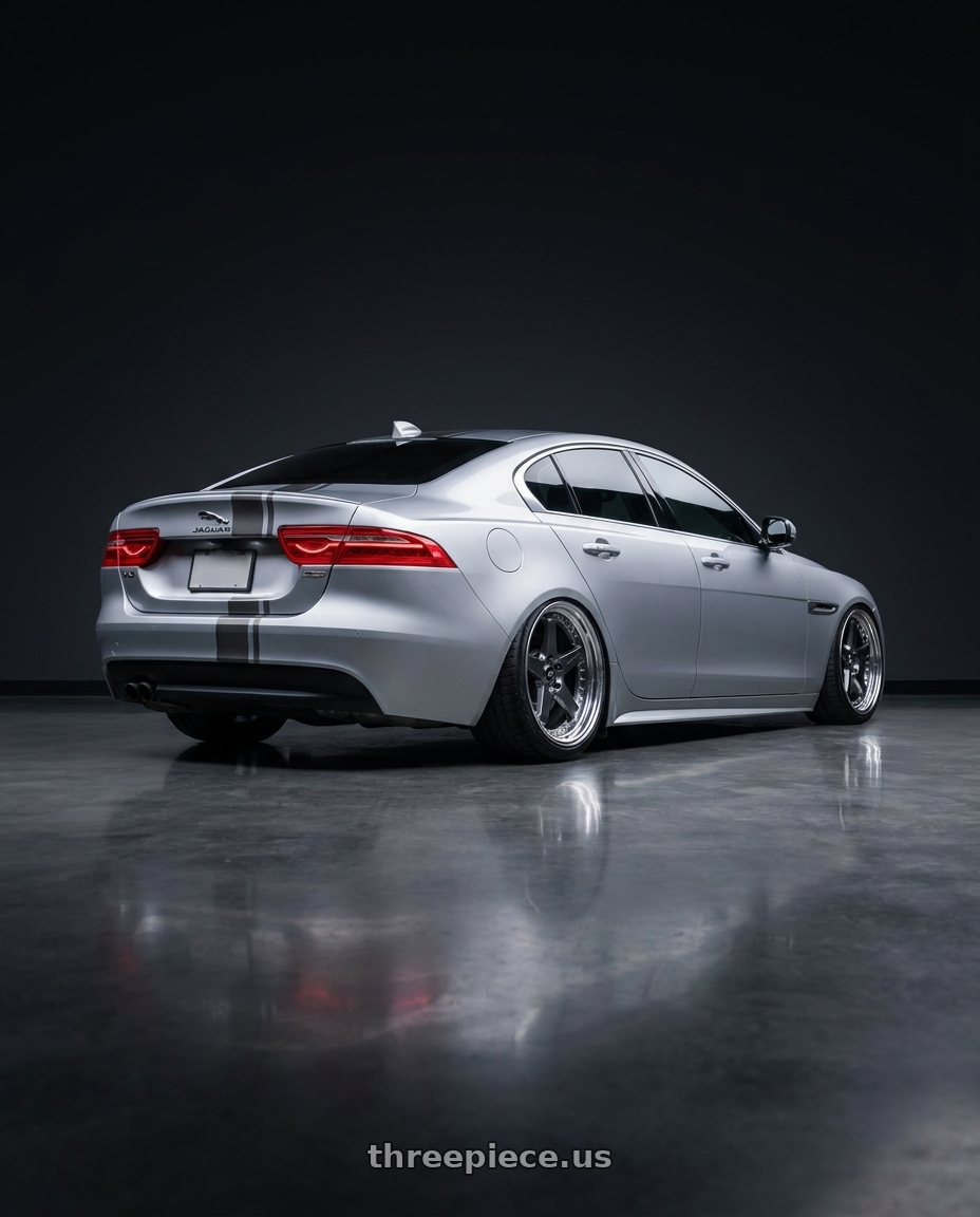 2017 Jaguar Xe 25t with Work Zistance W5s 5x114.3 19x8.5+32 s disk Brilliant Silver Black wheels rear three quarter view meaty tires