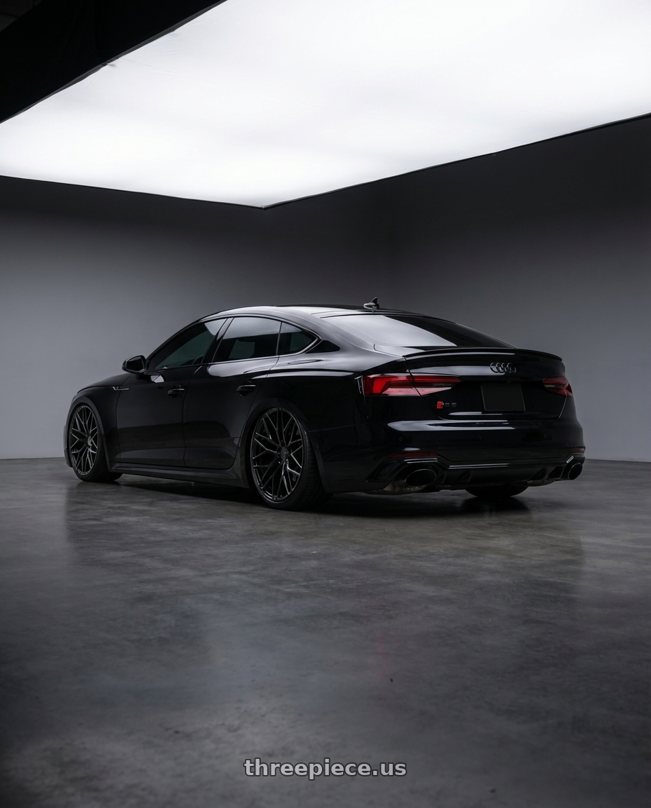 2022 Audi RS5 with Avant Garde Wheels M520R 5X112 20x10 +35 Gloss Black wheels rear three quarter view slight stretch tires