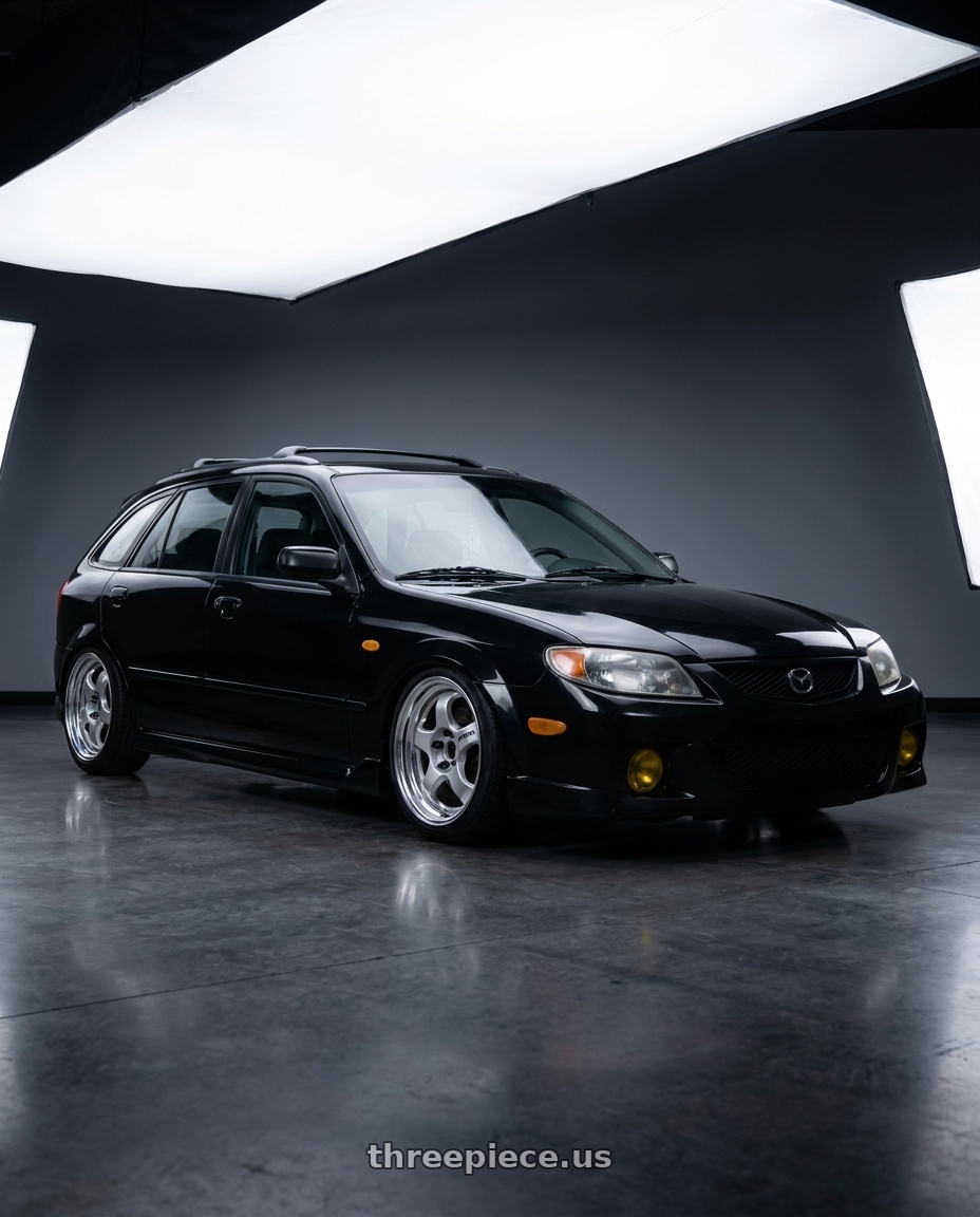 2002 Mazda Protege5 with Work Meister S1 2P 5x114.3 15x6.5+38 A Disk Silver wheels