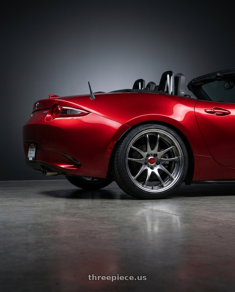 2024 mazda mx5 with Work Cr 2P 4x100 17x8.0 +38 GT Silver wheels rear three quarter view square tires