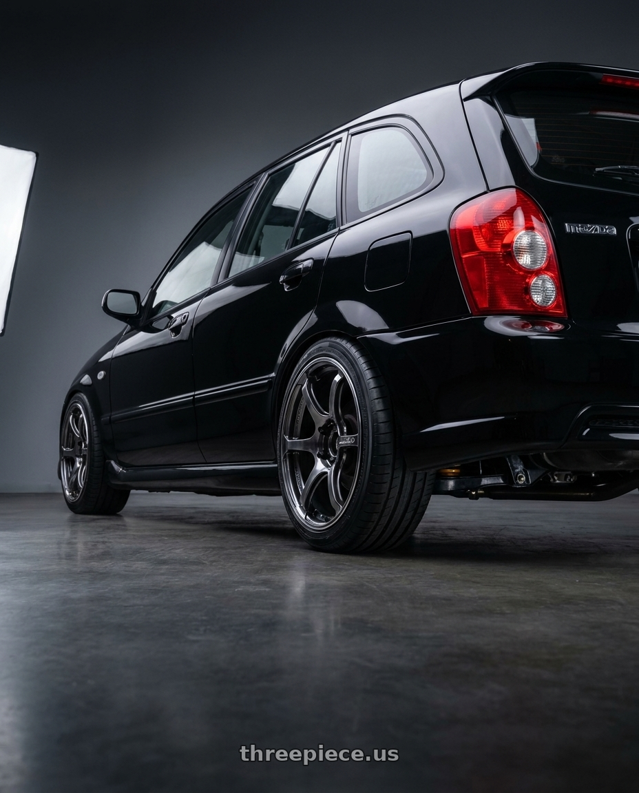 2002 Mazda Protege5 with Advan Racing RG-4 5x114.3 17x7.5 +48 RACING HYPER BLACK & RING wheels rear three quarter view square tires
