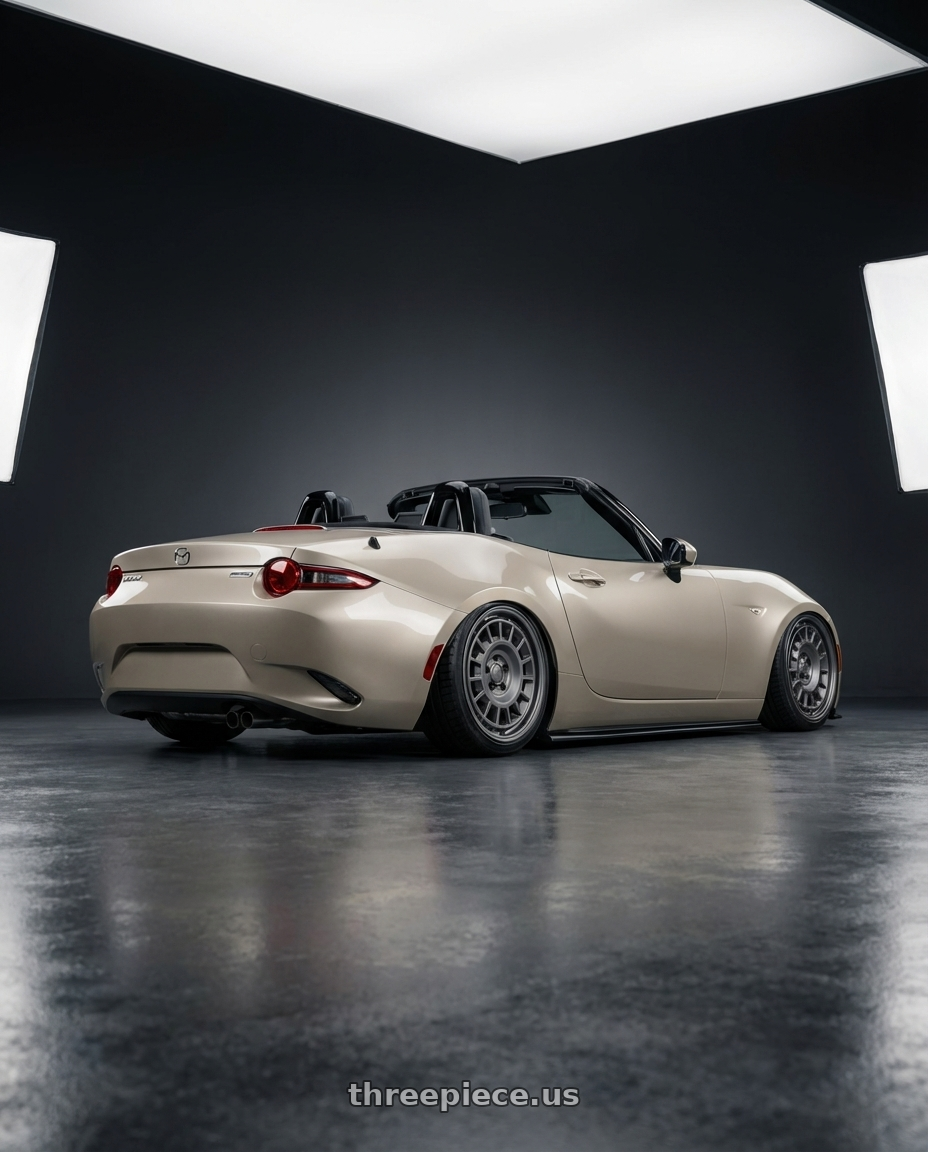 2021 Mazda MX-5 Miata ND with fifteen52 ALPEN MX 5x114.3 17x8 +38 FROSTED GRAPHITE (SATIN GREY) wheels rear three quarter view slight stretch tires