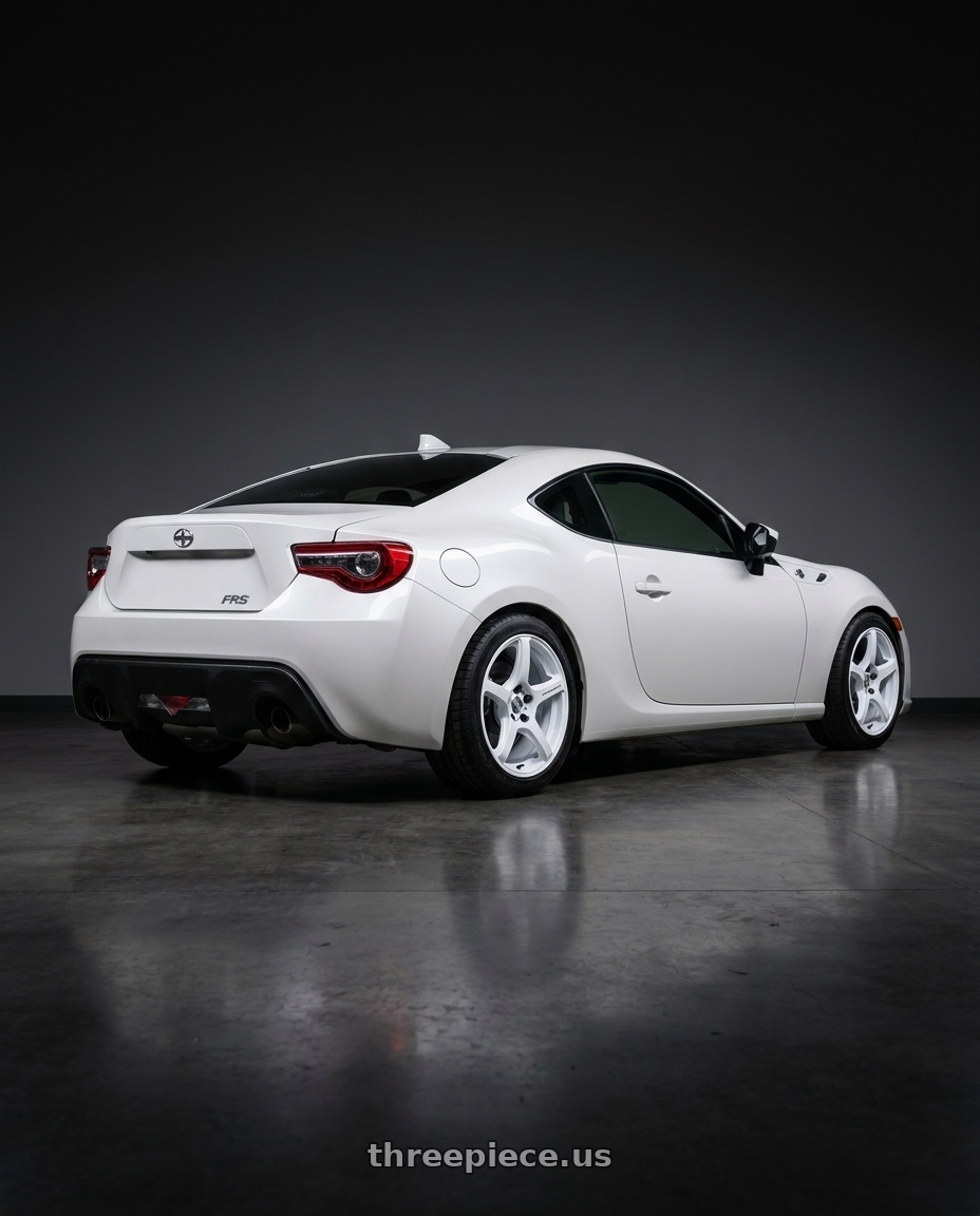 2016 Scion FRS with Work Emotion T5r 5x100 17x7 +48 Ice White wheels rear three quarter view square tires