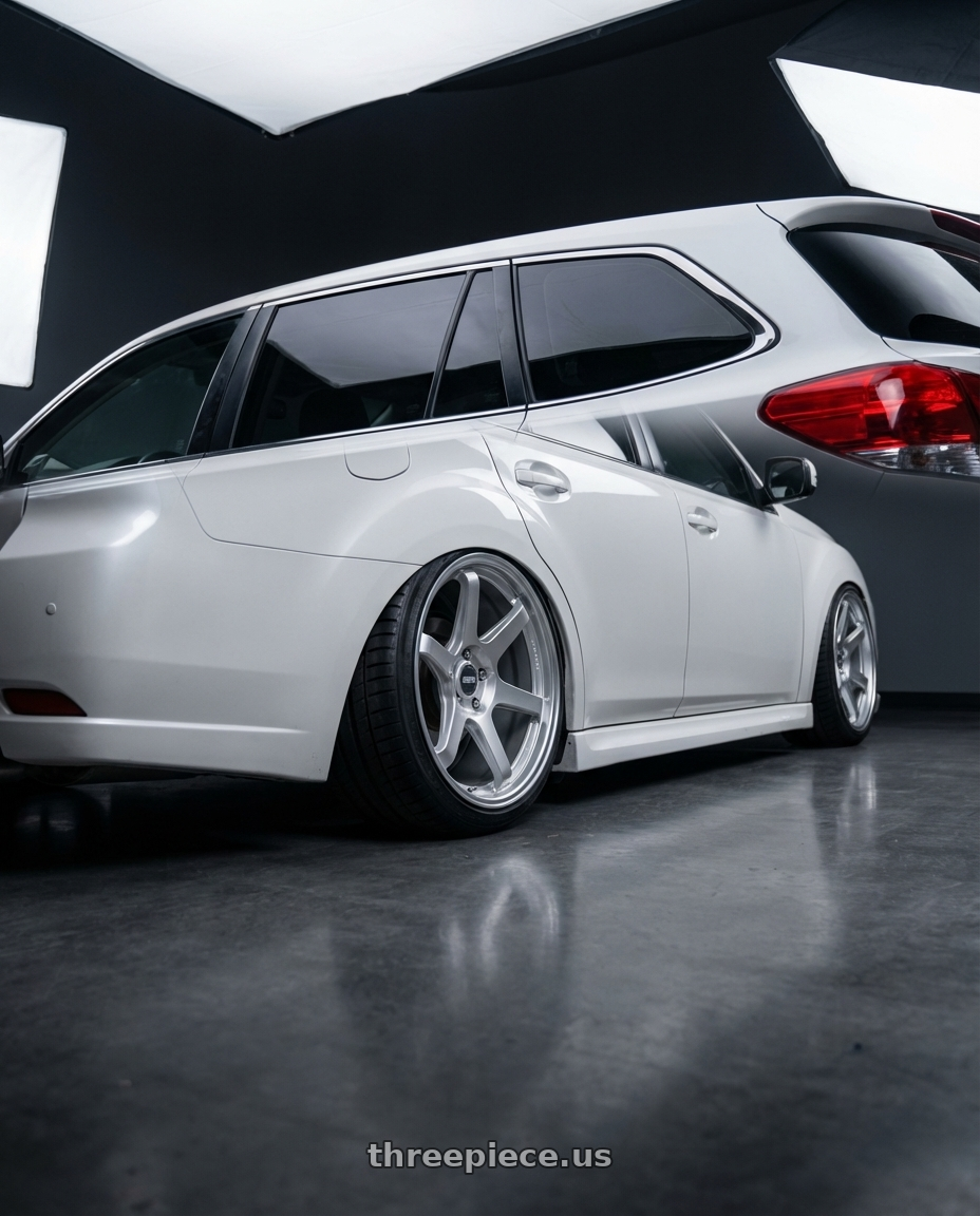 2011 Subaru Legacy Wagon with ESR Wheels APEX SERIES APX6 5x112 19x9.5 +35 Hyper Silver wheels rear three quarter view square tires