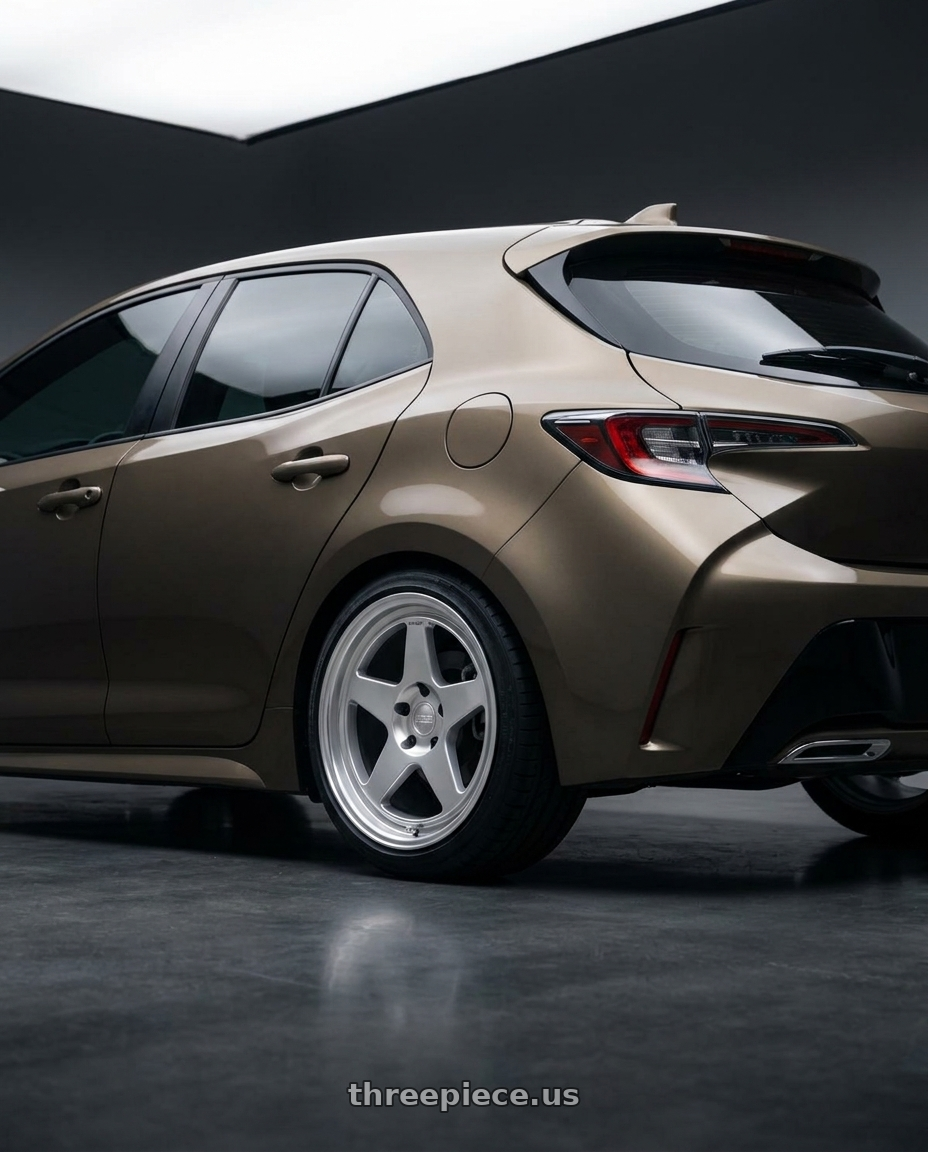 2019 Corolla hatch se oxidize bronze no spoiler with Kansei K12H KNP 5X100 18x9 35 Hyper Silver wheels rear three quarter view square tires