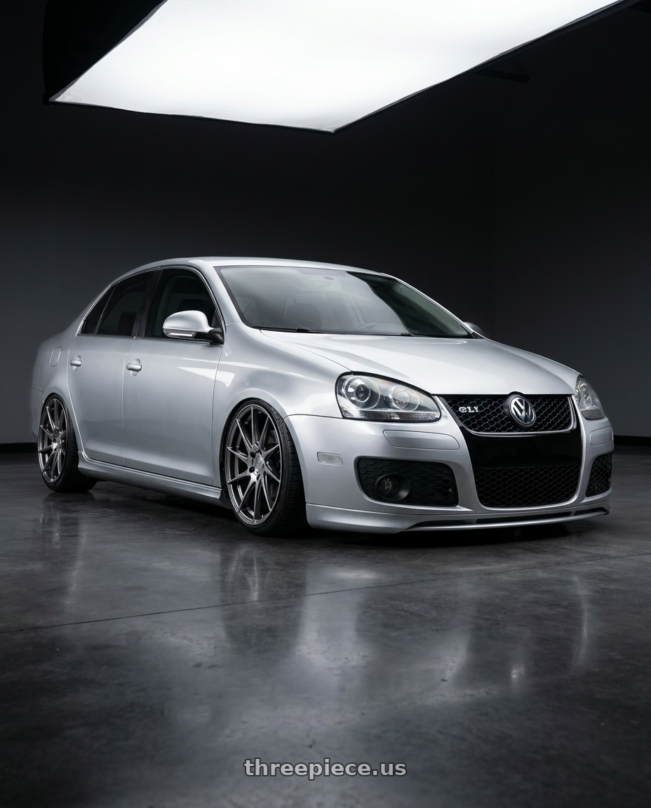 2009 Volkswagen Jetta GLI MK5 with Aodhan AH09 5x112 18x9.5 +35 Hyper Black wheels