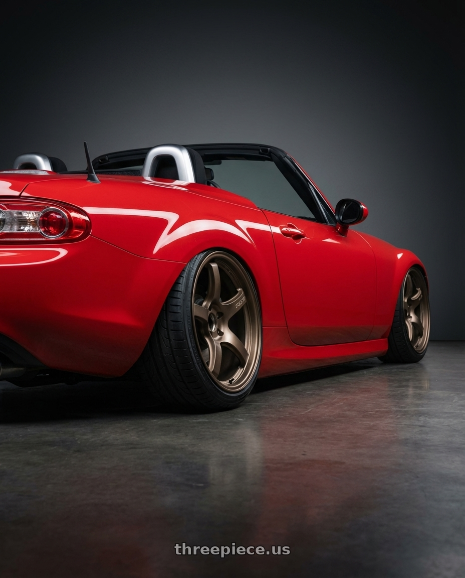 2012 Mazda MX-5 Miata NC with Gram Lights 57CR 5x114.3 17x9+22 Bronze II wheels rear three quarter view slight stretch tires