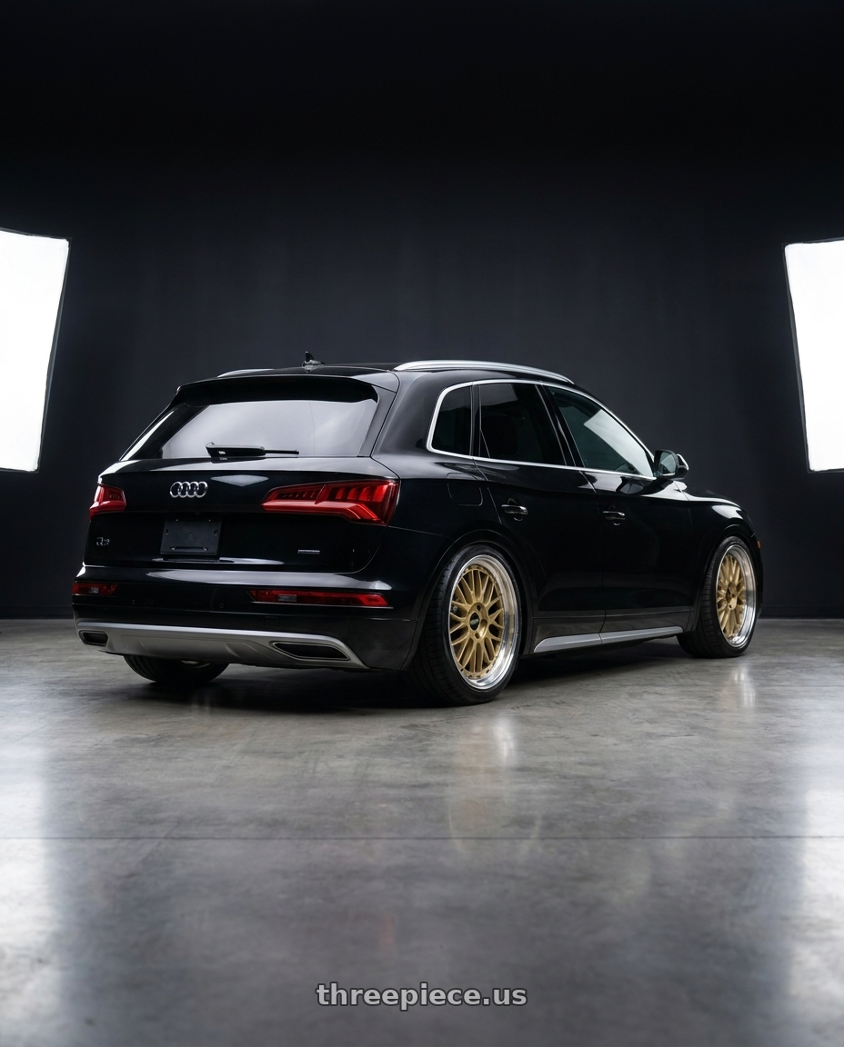 2021 Audi Q5 with BBS LM 5x120 17x8.5 +18 Gold Center Diamond Cut Lip wheels rear three quarter view slight stretch tires