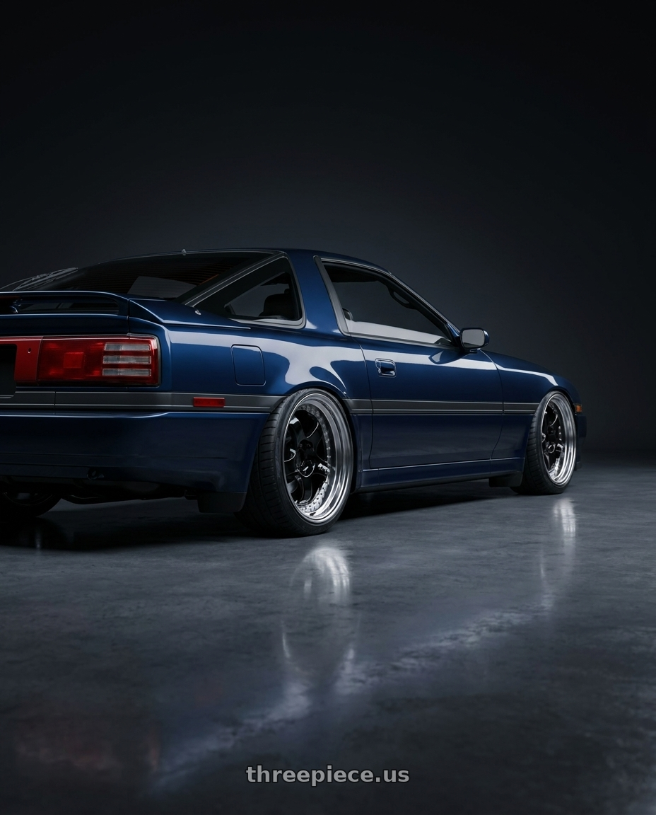 1987 Toyota Supra with Work Meister S1 3P 5x100 18x10+35 A Disk Black wheels rear three quarter view slight stretch tires