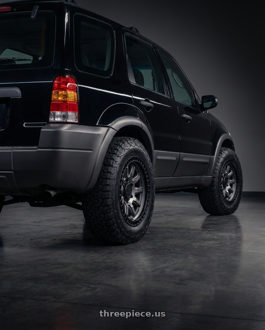 2003 Ford Escape 2.0 with Black Rhino CALICO 5X114.3 17X8.5 +34 MATTE GUNMETAL W/ MATTE BLACK LIP wheels rear three quarter view meaty tires