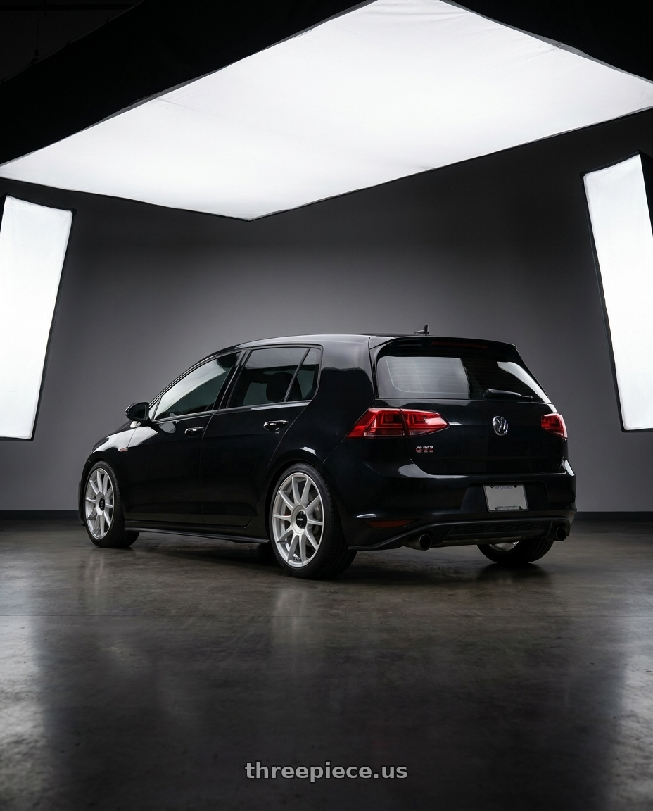 2017 Vw gti with Rotiform DTM 5x108 / 5x112 18x8.5 +45 Silver wheels rear three quarter view square tires