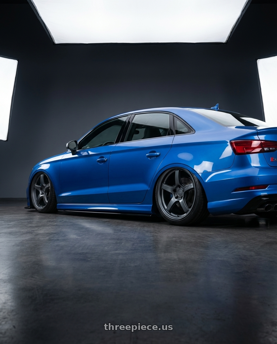 2019 Audi S3 8V with Gram Lights 57CR 5x112 19x10.5+22 Gunblue II wheels rear three quarter view slight stretch tires