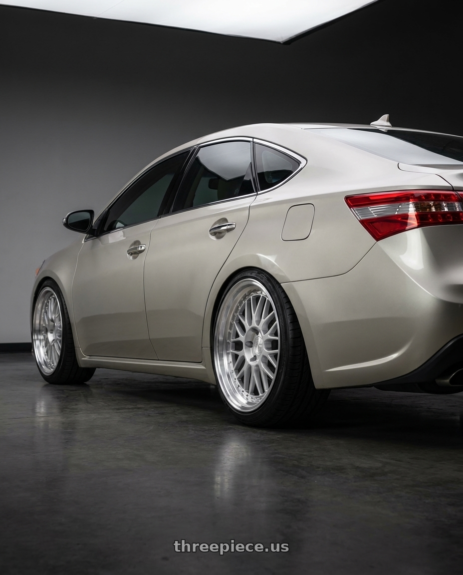 2013 toyota avalon with Aodhan AH02 5x114.3 18x8.5+35 Silver w/ Machined Lip wheels rear three quarter view slight stretch tires