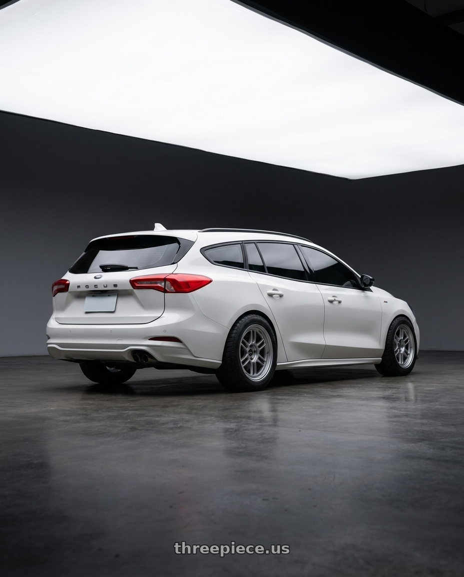 2024 Ford focus with Enkei RPF1 5x114.3 18x8.5+30 Silver wheels rear three quarter view meaty tires