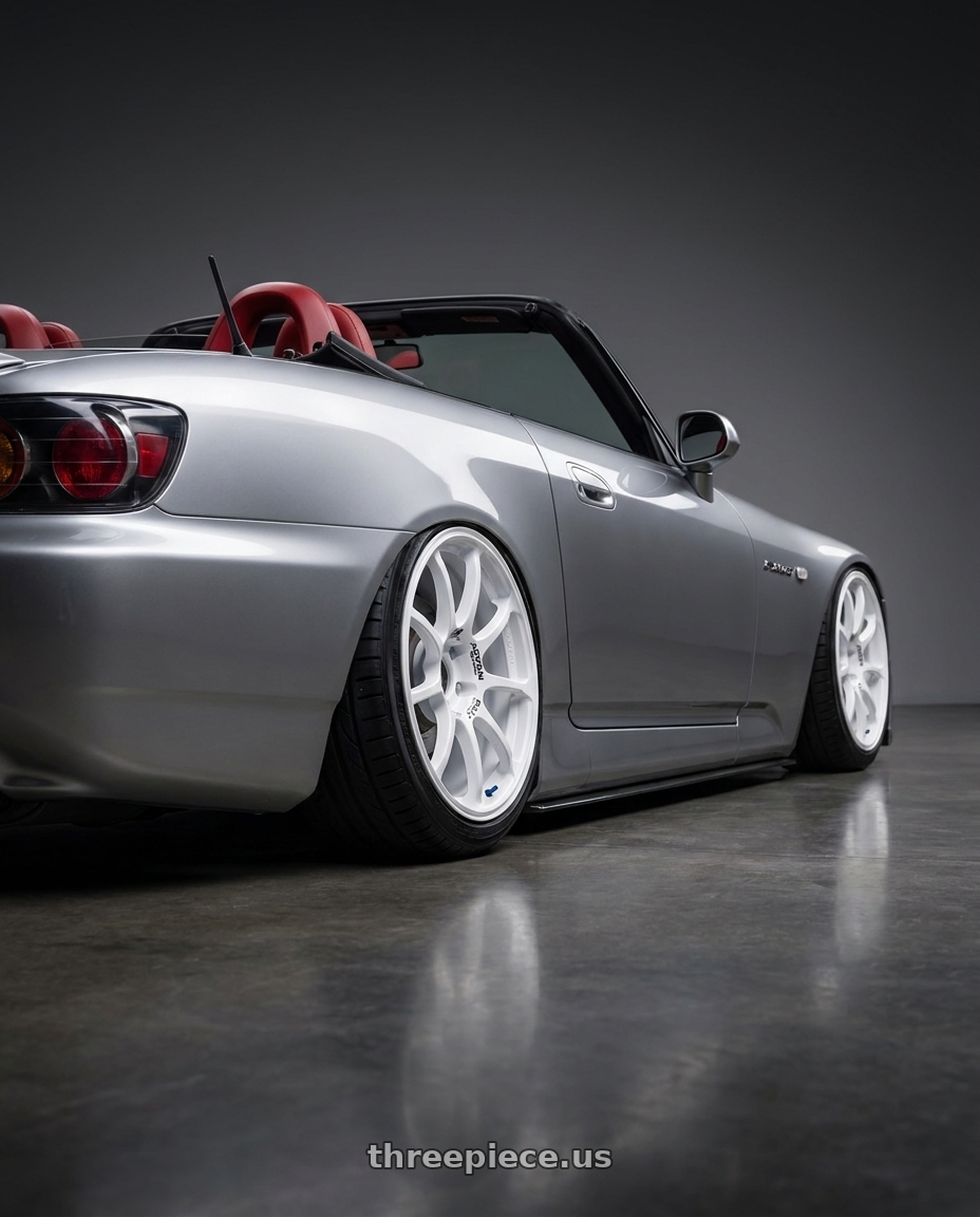 2009 Honda S2000 with Advan RCIII 5x114.3 17x8+38 White wheels rear three quarter view slight stretch tires