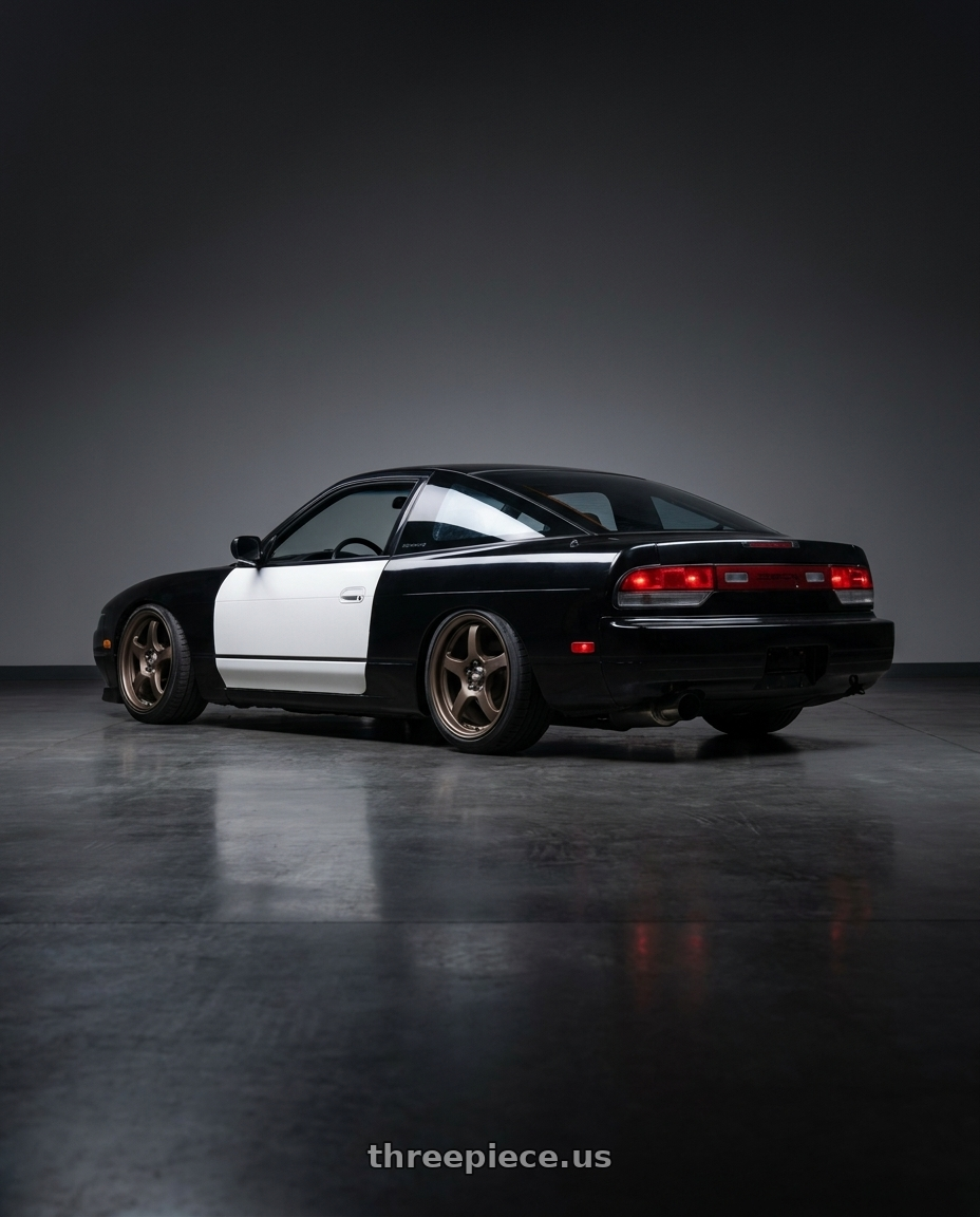 1992 Nissan 240sx Hatchback, Black with white doors and dspec tailights with Motegi MR131 5X114.3 17X8 +40 MATTE BRONZE wheels rear three quarter view square tires