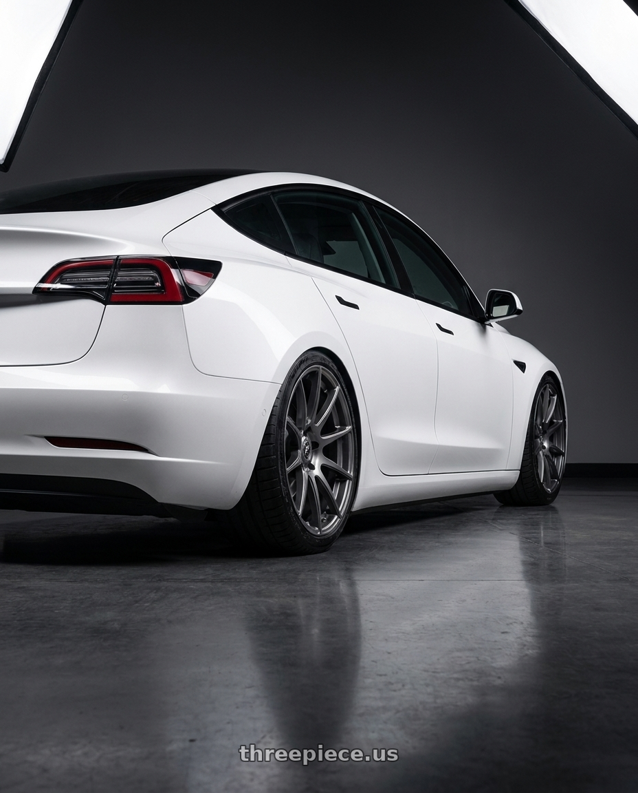2023 Tesla Model 3 with Forgestar CF10 5x114.3 19x9 +35 Gloss Anthracite wheels rear three quarter view slight stretch tires