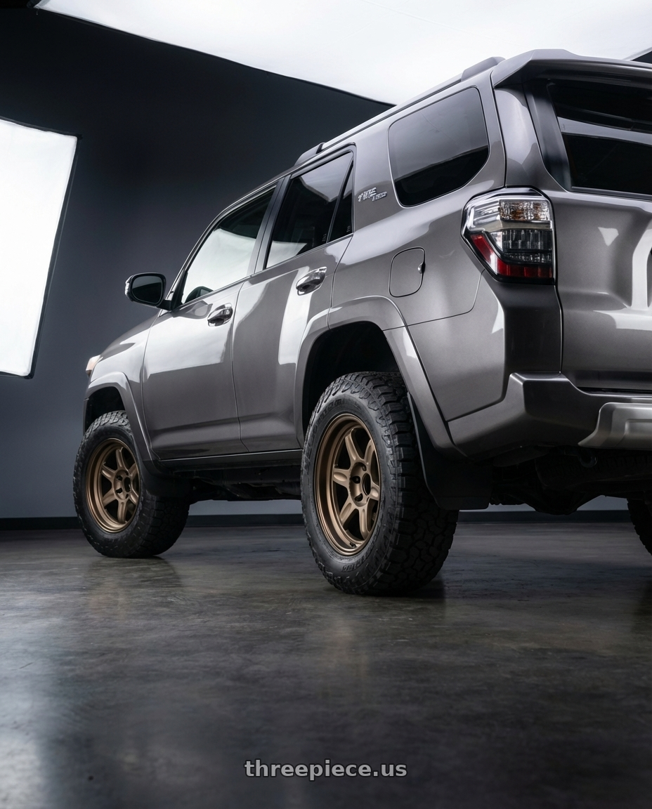 2016 4runner limited with Volk Racing 21C 5x112 18x10.5 +30 BRONZE wheels rear three quarter view meaty tires