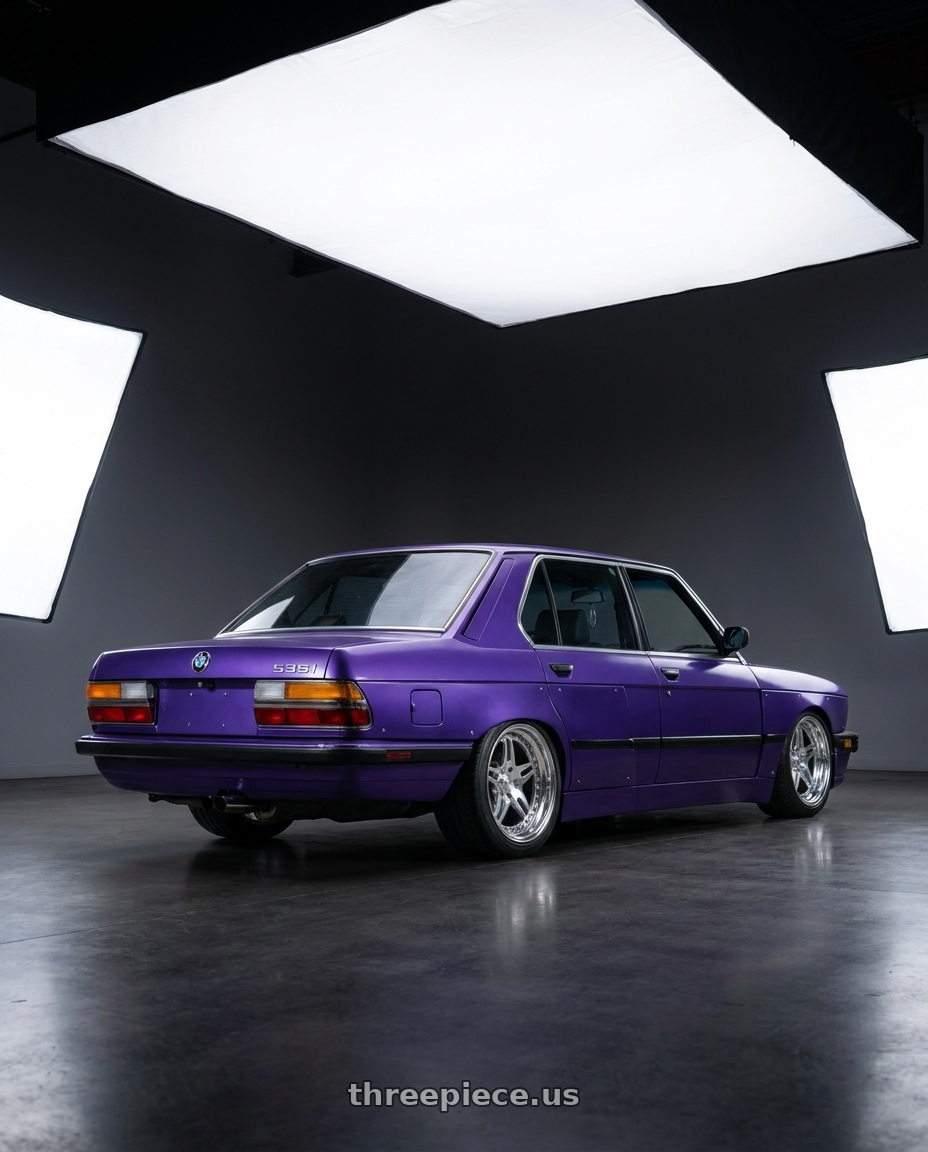 1985 BMW 535i with CCW SA52 5x120 17x9 +0 Polished wheels rear three quarter view square tires