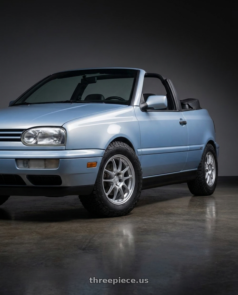 1998 volkswagen cabrio light blue  with Enkei PF01 4x100 15x7+35 Silver wheels