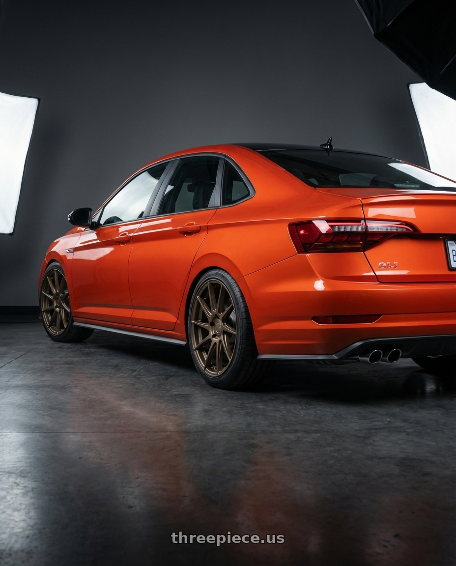 2023 Volkswagen Jetta GLI MK7 with Aodhan AH09 5x112 18x9.5 +35 Matte Bronze wheels rear three quarter view square tires