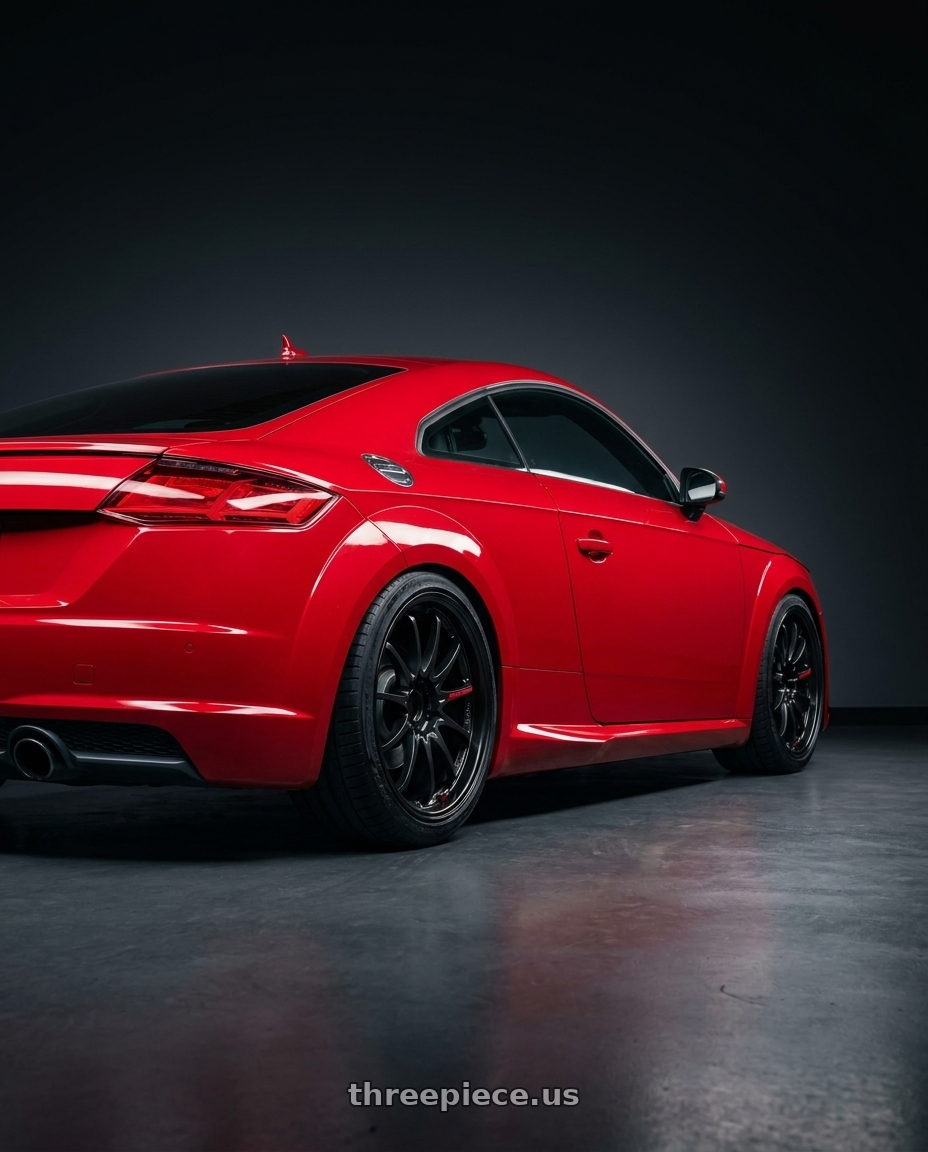 2015 Audi TT with Volk Racing CE28 Club Racer II 5x112 18x8.5+44 Black Edition wheels rear three quarter view slight stretch tires