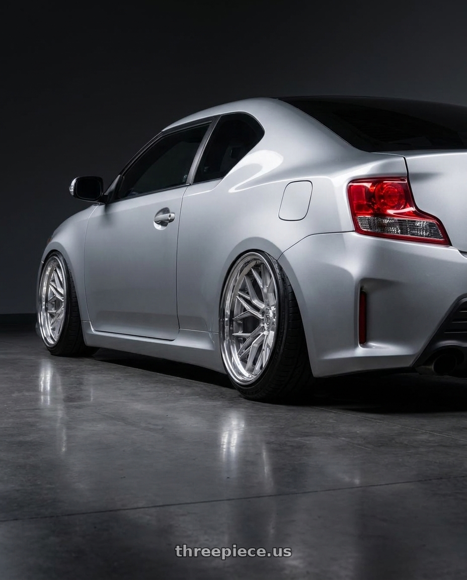 2012 scion tc with Rohana RFC3 5x114.3 20x10 +40 Machine Silver/Stainless Lip wheels rear three quarter view extreme stretch tires