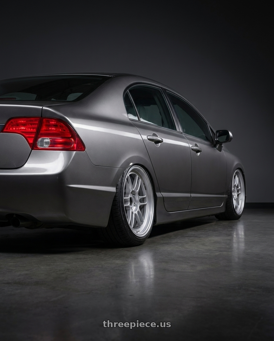 2007 Honda civic with Enkei RPF1 5x114.3 17x7+45 Silver wheels rear three quarter view slight stretch tires