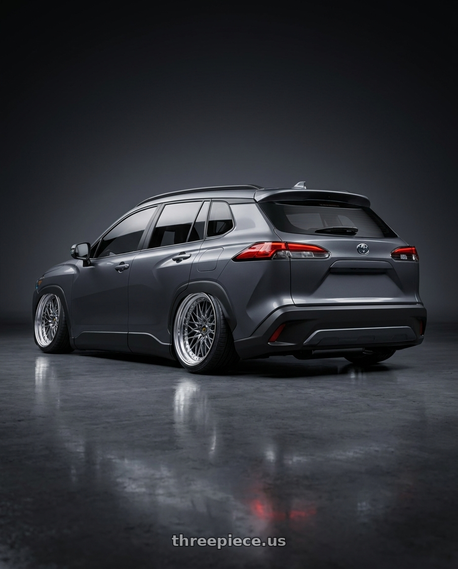 2023 Toyota Corolla cross with Work Vs-Xv 5x100 18x8.5-5 A Disk Brilliant Silver Black wheels rear three quarter view extreme stretch tires