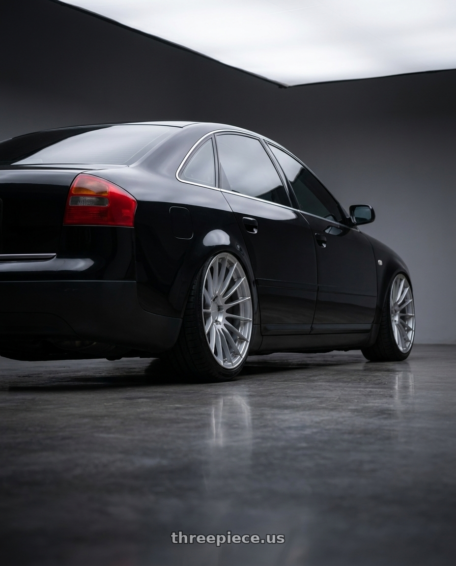 bagged 1999 audi a6 c5  with Enkei RS05-RR 5x114.3 18x11+16 Sparkle Silver wheels rear three quarter view slight stretch tires