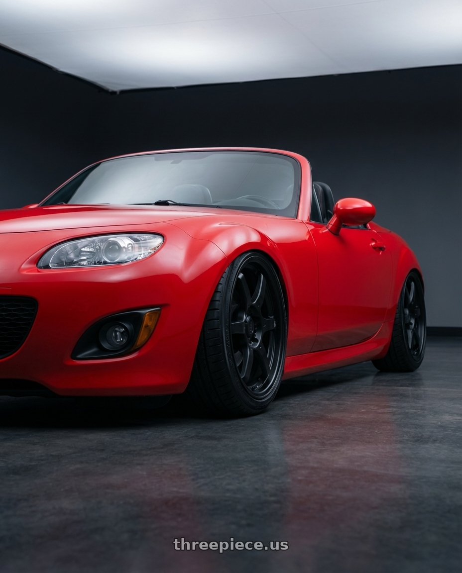 2012 Mazda MX-5 Miata NC with Konig Backbone 5x114.3 17x7.5+45 Matte Black Milling Logo on Spoke wheels front three quarter view stanced stance