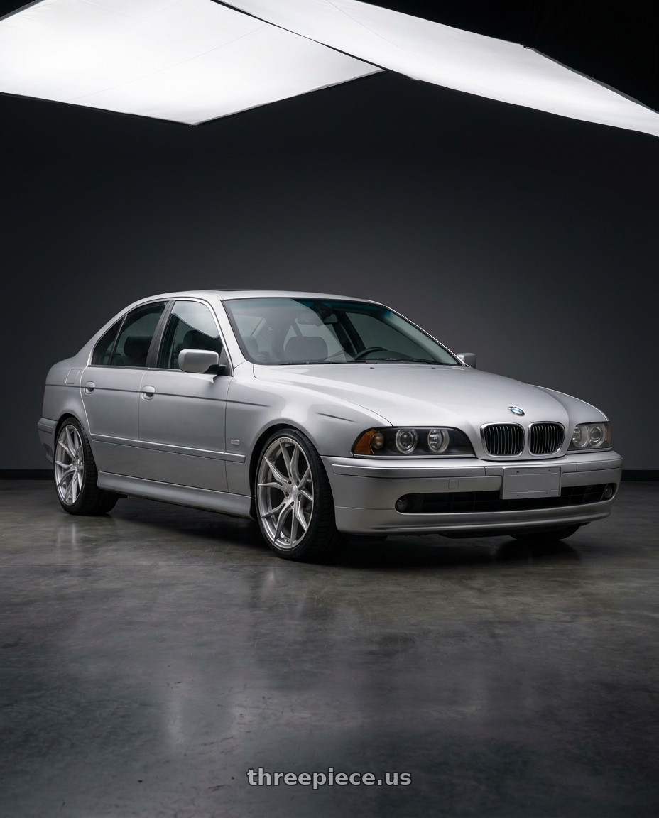 2002 BMW 525i with Rohana RFX5 5x120 19x8.5+20 Brushed Titanium wheels front three quarter view lowered stance