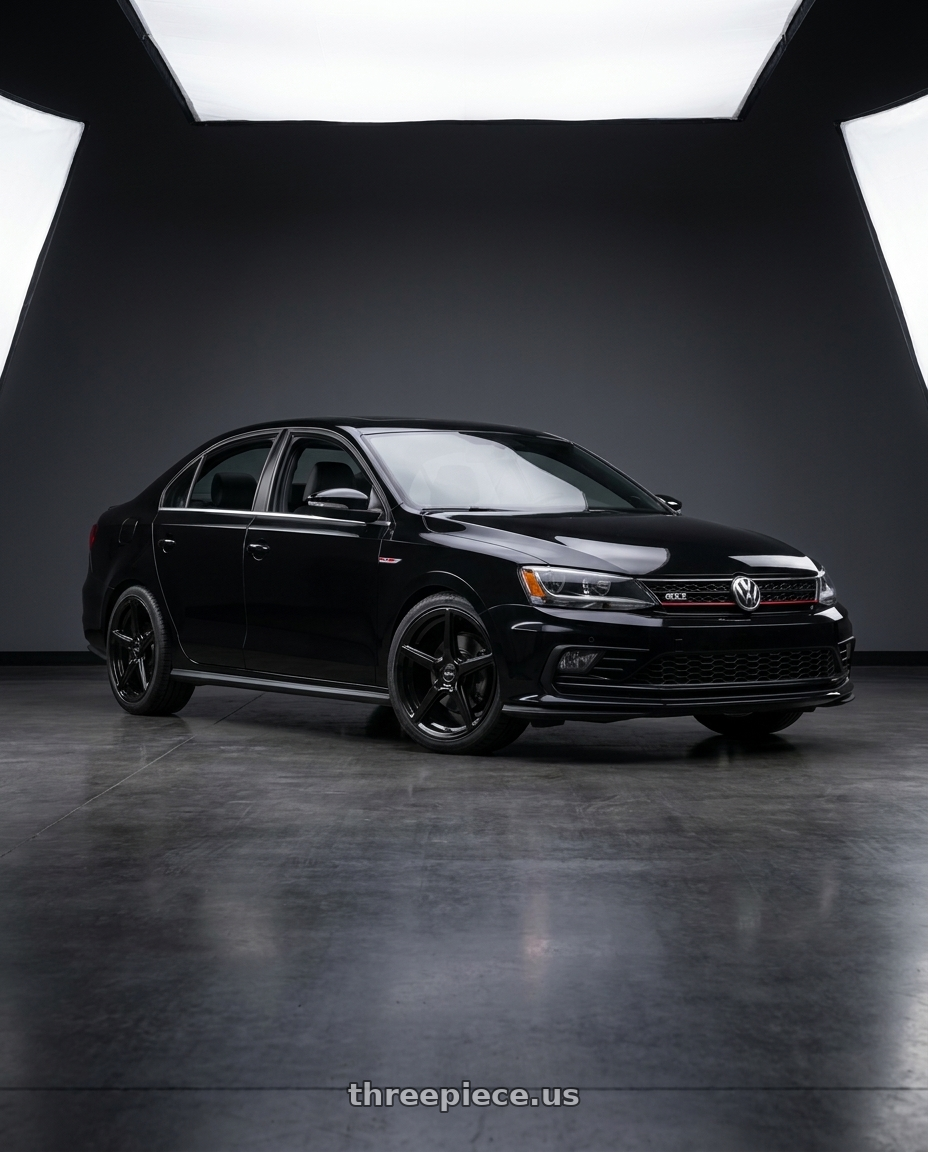 2017 VW Jetta with Motiv 433B Blade 5X112 17x7.5 +40 Gloss Black wheels