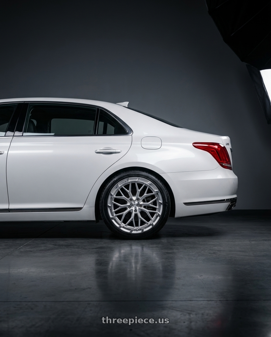 2018 genesis g90 ultimate with DOLCE PERFORMANCE MAGARI 5x114.3 20x10 +40 Gloss Silver wheels rear three quarter view square tires