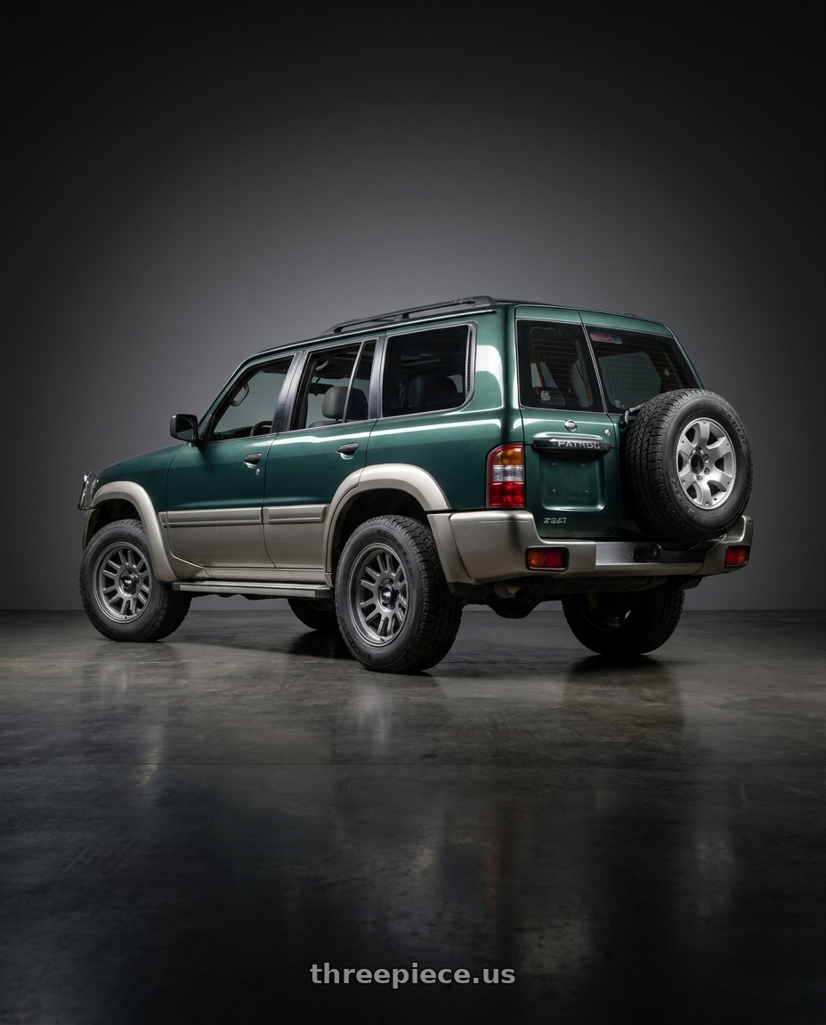 2001 Nissan Patrol with Dirty Life Canyon 9310 6x139.7 17x9-12 Satin Graphite wheels rear three quarter view square tires