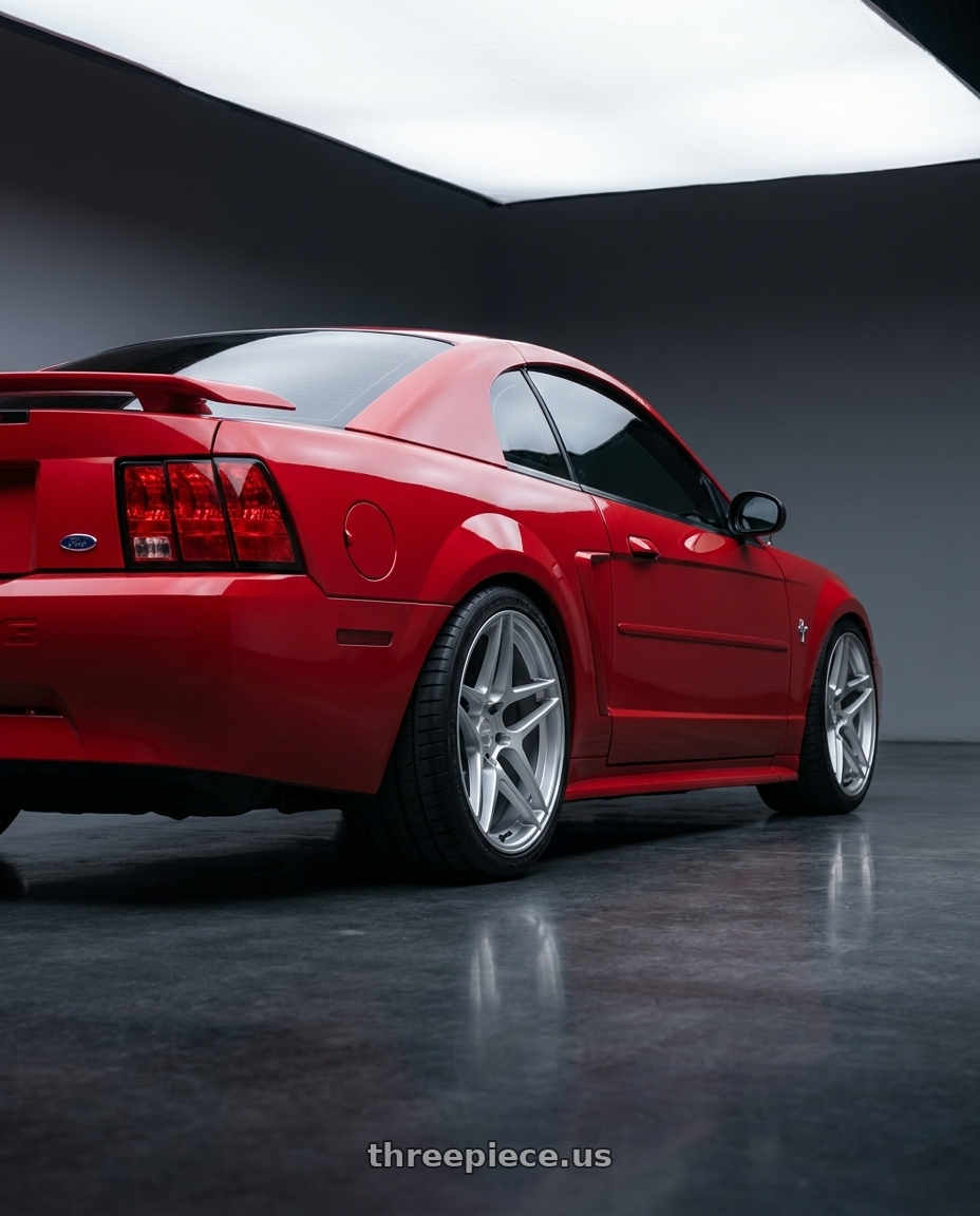 2002 ford mustang with Kansei K15H Astro 5x114.3 18x9.5 22 Hyper Silver wheels rear three quarter view square tires
