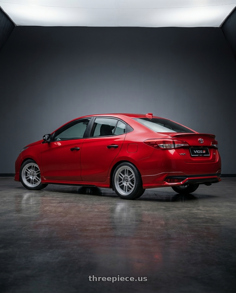 Toyota vios GRS 2021 with Enkei RPF1 4x100 16x7+35 Silver wheels rear three quarter view square tires