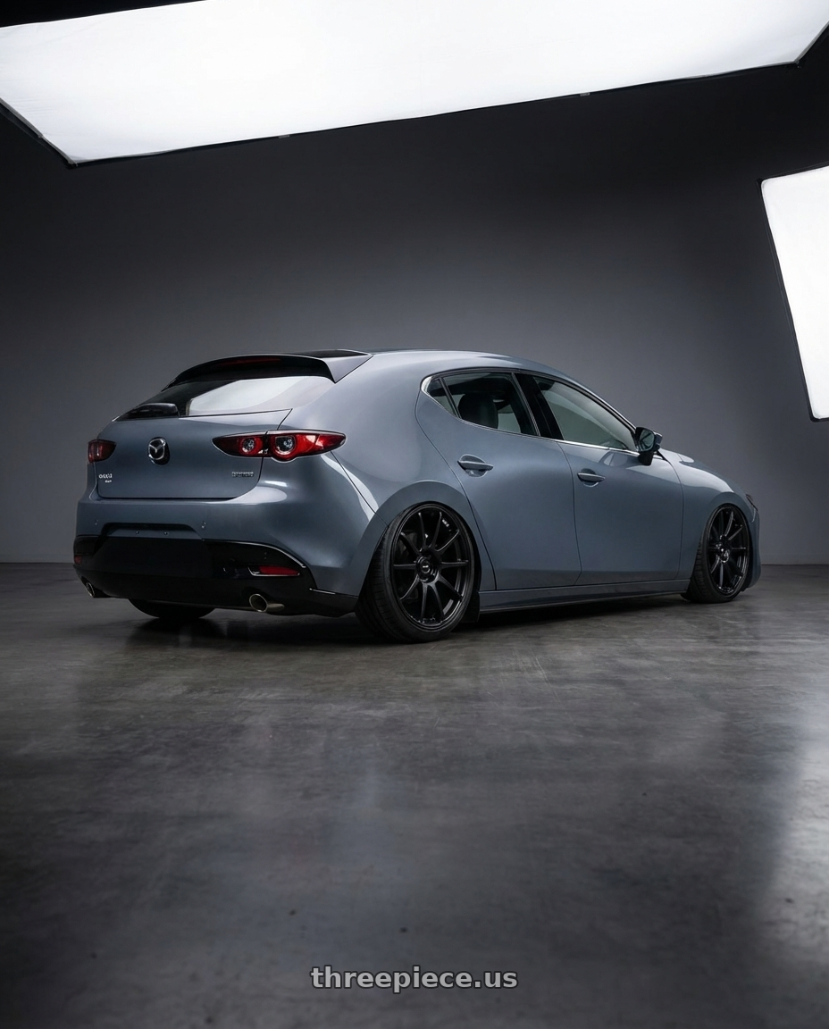 2023 Mazda Mazda3 Turbo with Ssr Gtv02 5x114.3 18x8+35  FLAT BLACK wheels rear three quarter view slight stretch tires