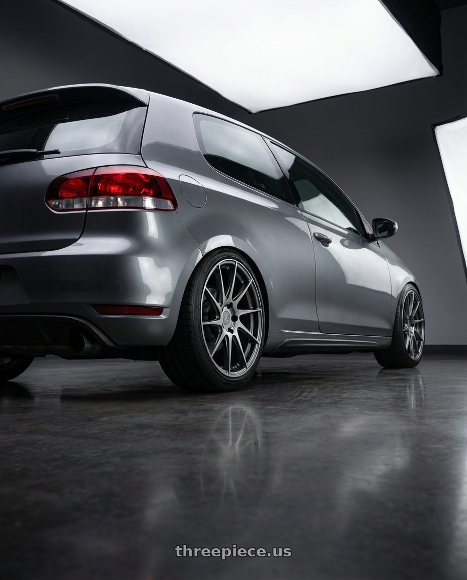 2013 Volkswagen GTI MK6 with Aodhan AH09 5x112 18x8.5 +35 Hyper Black wheels rear three quarter view square tires