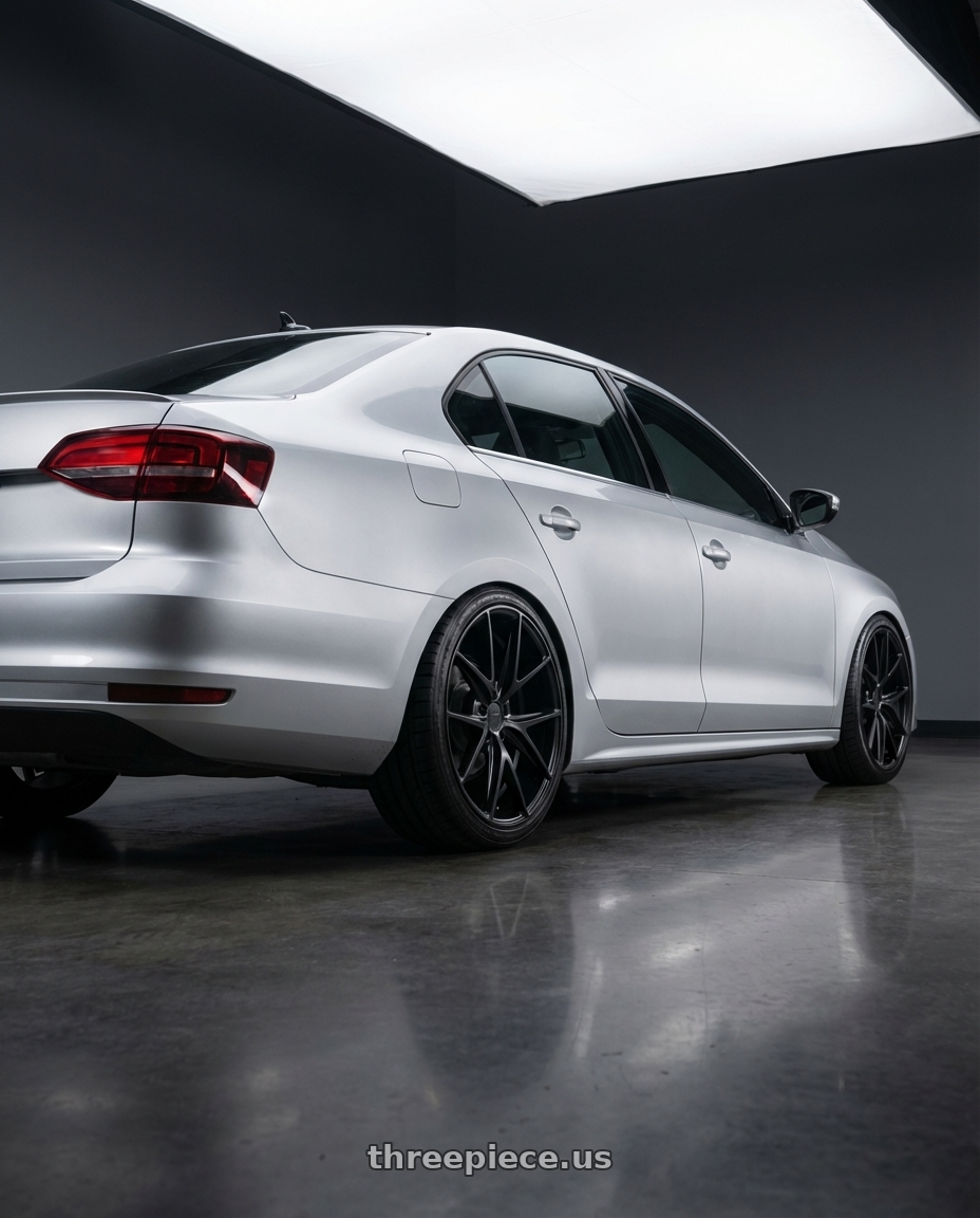 2016 Volkswagen Jetta GLI MK6 with Niche 1PC M117 MISANO 5X112 18X9.5 +35 MATTE BLACK wheels rear three quarter view square tires