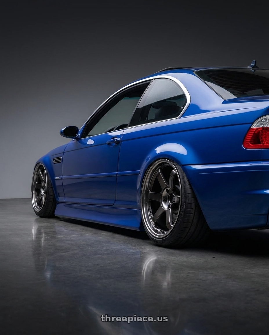 2003 bmw 330i with Volk Racing TE37SL 5x114.3 19x10.5+12 Pressed Double Black wheels rear three quarter view slight stretch tires