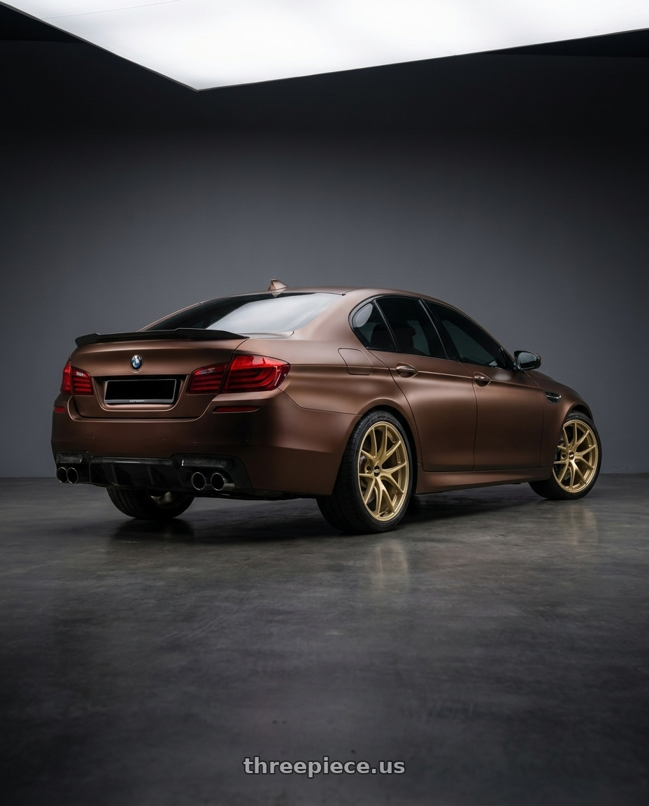 2018 bmw f10 with BBS RI-A 5x130 19x10.5 +43 Gold wheels rear three quarter view square tires
