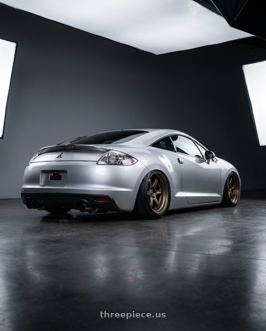 2010 Mitsubishi Eclipse with Kansei K11B Tandem 5x114.3 19x9.5 22 Bronze wheels rear three quarter view slight stretch tires