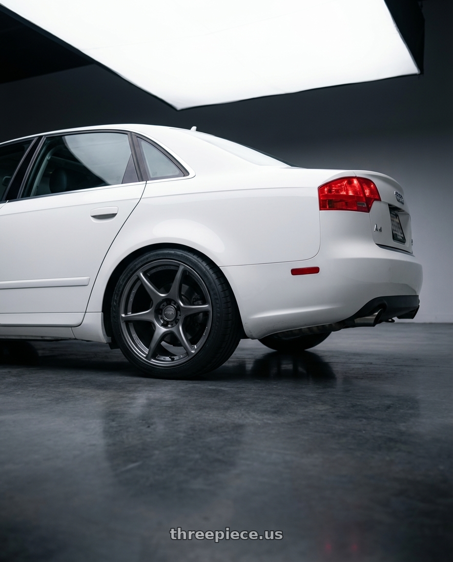 2010 Audi A4 B7 with Kansei K11G Tandem 5X112 18x8.5 35 Gunmetal wheels rear three quarter view square tires