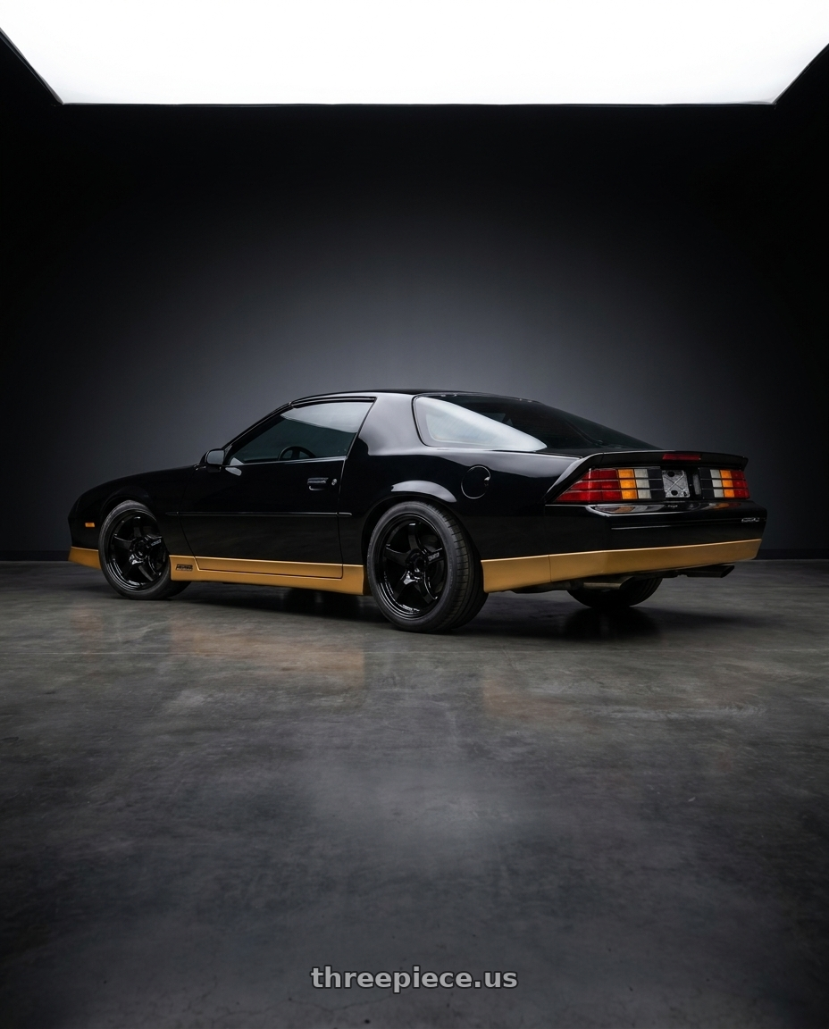 1988 Chevrolet Camaro with Gram Lights 57CR 4x100 17x7 +40 Gloss Black wheels rear three quarter view square tires