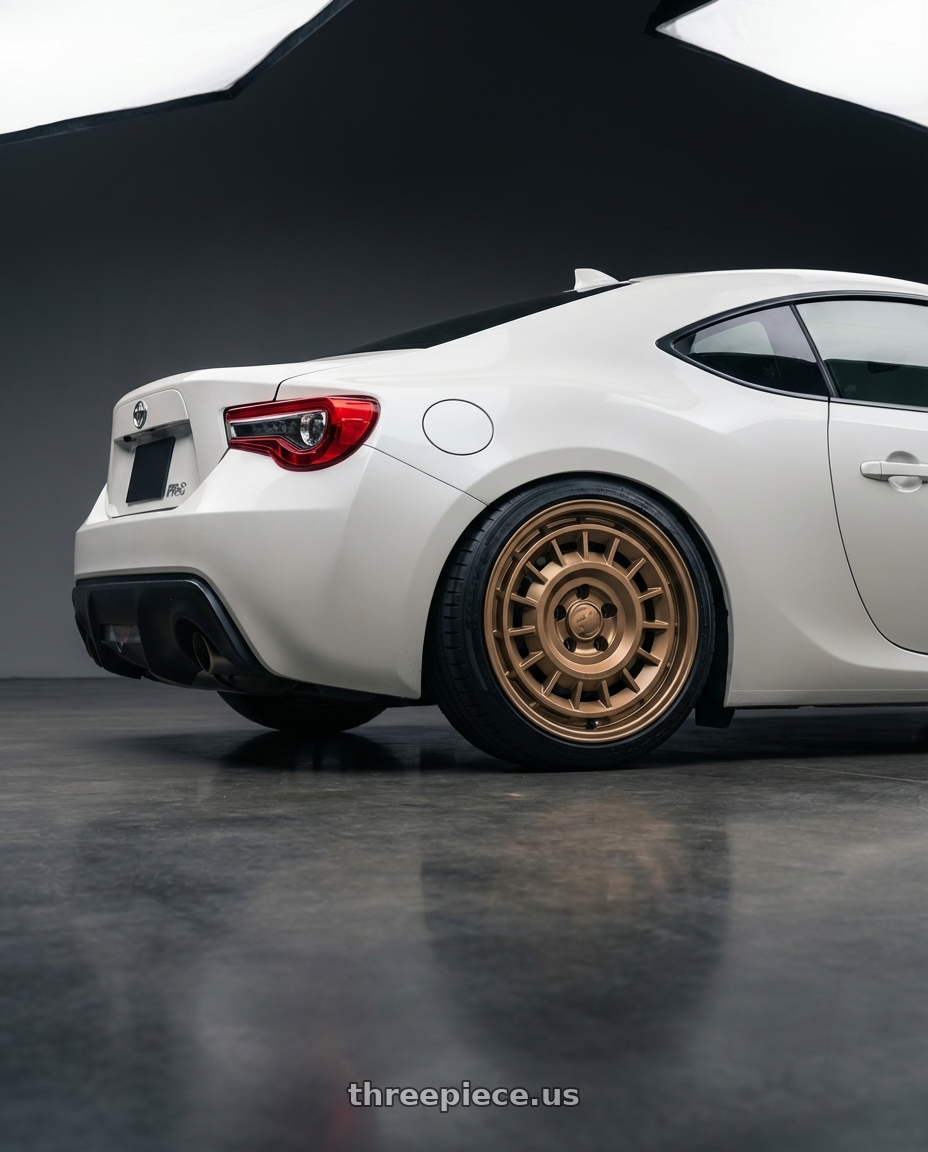 2016 Scion FR-S with fifteen52 ALPEN MX 5x100 17x8 +38 DESERT BRONZE (MATTE BRONZE) wheels rear three quarter view square tires